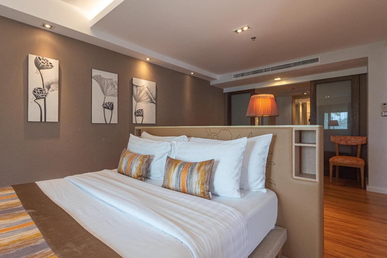 Summit Windmill Golf Suite Hotel At Suvarnabhumi Bangkok Eksteriør billede A bedroom at the hotel