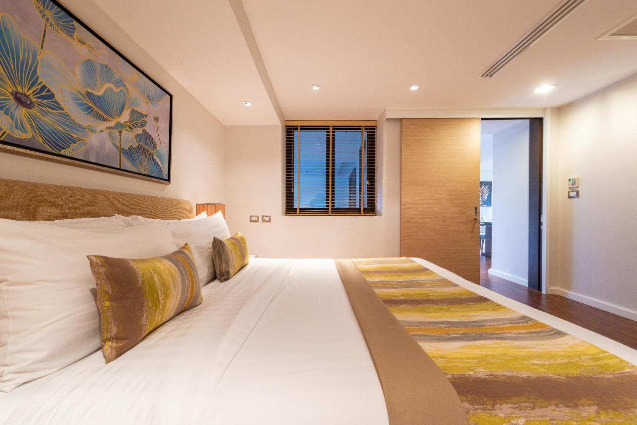 Summit Windmill Golf Suite Hotel At Suvarnabhumi Bangkok Eksteriør billede A bedroom at the hotel
