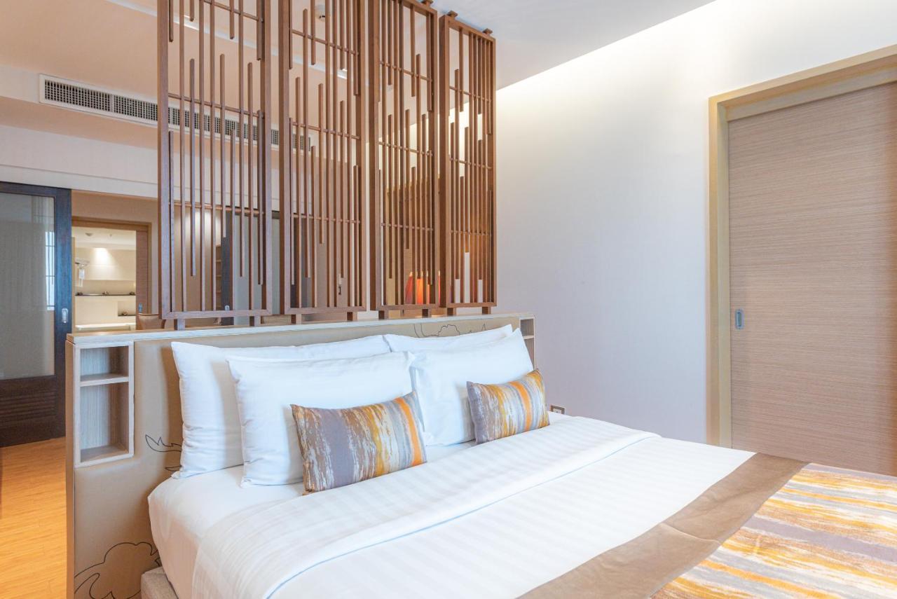 Summit Windmill Golf Suite Hotel At Suvarnabhumi Bangkok Eksteriør billede A bedroom at the hotel
